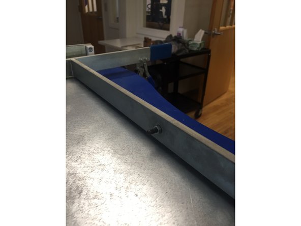 Place the top frame on top of the bottom frame so the inner cut out rectangles are lined up.