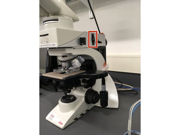 Camera aperture adjustment. The objective lenses are marked with thin color band, adjust this dial to the matching color for the best contrast in captured images.