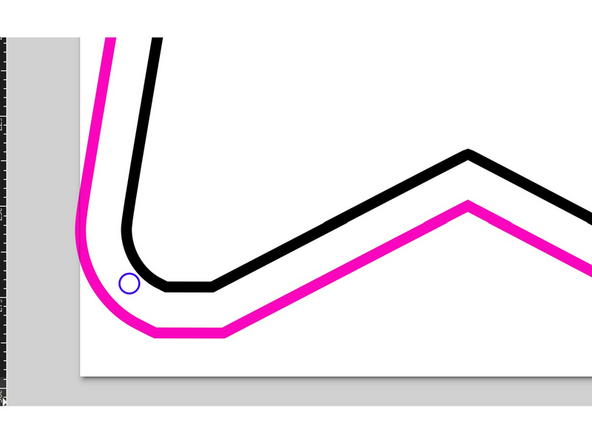 Create a hole by using the circle tool on the side bar. Click and drag to create a circle.