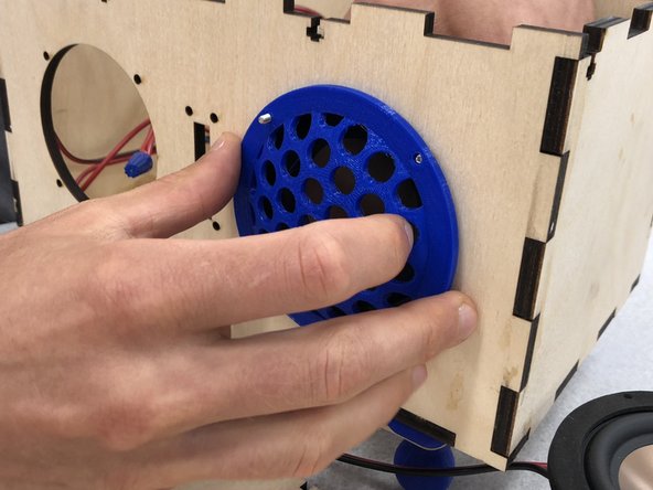 The speakers will be inserted from the inside of the box.  Attach the speakers with 5/8&quot; screws.  It's most helpful to put the screws in the speaker (from back to front) before you insert them into the box, then align with the screw holes in the top.  The leads should point to the top.