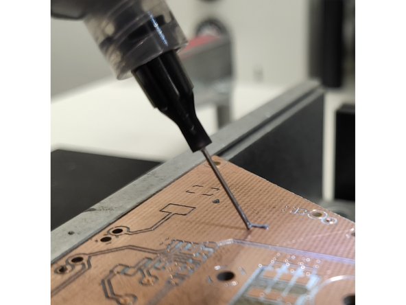 If this is your first time using the PnP you should begin in an empty section of your PCB where there are no traces or pads.  This will be your practice area.  Using the black knob, pull the nozzle down until it just meets your PCB.
