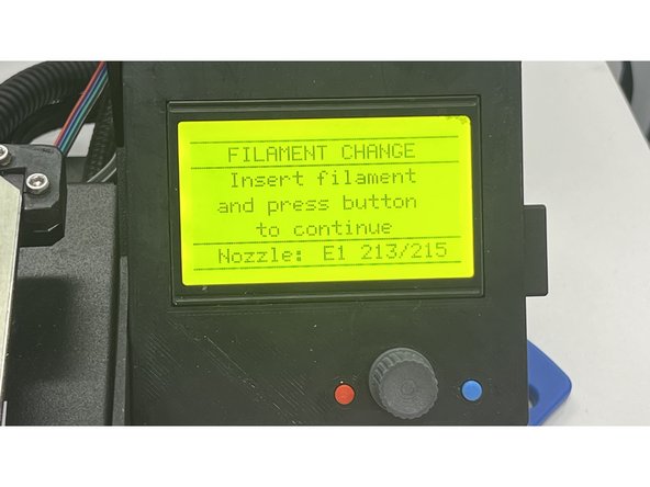 Gently feed the filament when it says so on the board.