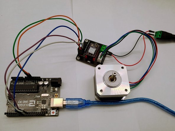 Gather the following components: stepper motor, DRV8825 driver, driver module, 12 V power adapter with barrel connector, Arduino (or equivalent), USB cable, connecting wires, and male-to-female jumpers.