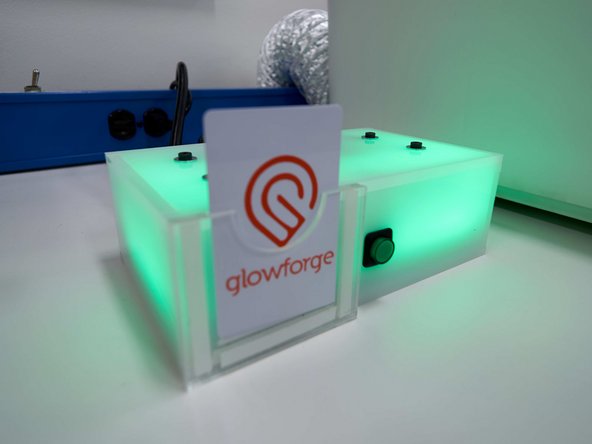 Upon turning on the cutter, the laser cutting head will run through a startup routine which will take a few minutes. Do not open the lid during this routine.  When the routine is complete the head will return to the back left corner of the Glowforge.   You may proceed with the next step of the tutorial while this process completes.