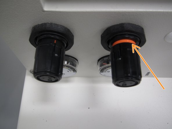 Pull out on the knob until the orange ring is exposed.  Rotate the knob clockwise to increase paste dispense rate (pressure) or counterclockwise to decrease dispense rate.  A good starting point is 0.3 MPa.