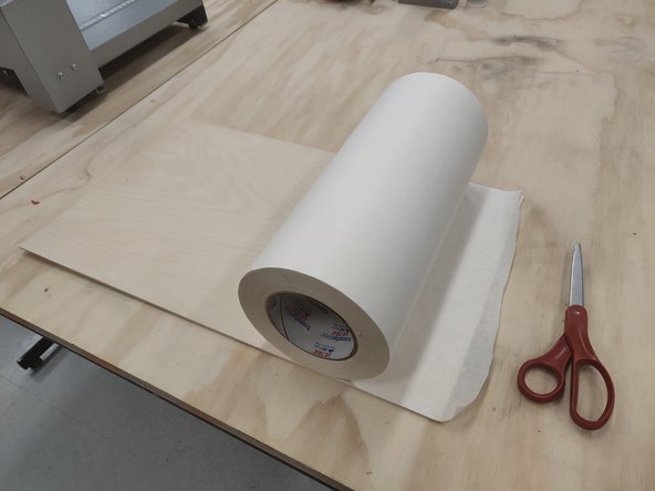 You may use the tape located on the Infrared Camera workstation. Simply apply it over your wood, and cut the edges with scissors.