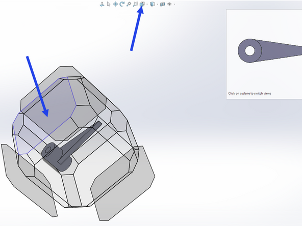 Use the View Orientation button and look at the arm from the top side.  To do this you can click on the appropriate face of the superimposed cube that encloses your model.  In the first image here the appropriate cube face is highlighted in blue.  Clicking on this face will rotate your arm so you are viewing the top face.