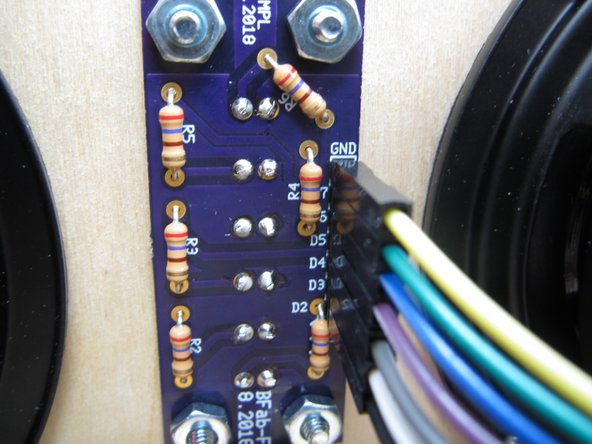 Connect the male end of the 7-pin ribbon cable to the Arduino.