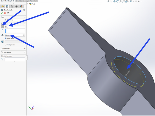 Make an extrusion of depth 0.4 mm.  You'll need to return to making a Blind extrusion from the dropdown menu.  Make sure you click the direction button to specify the correct direction.  You want your extrusion to point down into the cavity in order to cover the magnet.  See the final example image.