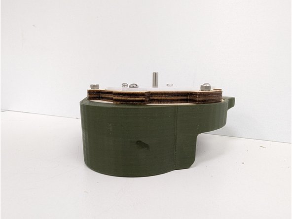 Place the shell front onto the shell back, aligning all of the various tabs with the PCB assembly.  The magnets in both the shell back and shell front should align properly and the opposite poles should keep the shell front in place.