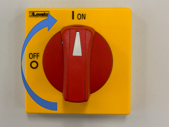 First turn on the machine by rotating the on switch on the left hand side clockwise.