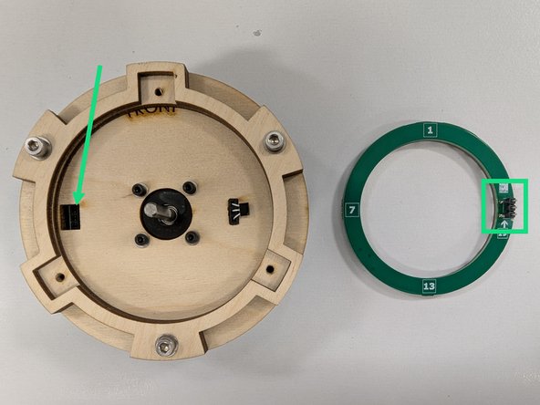 Your Neopixel ring may already be smooth along the edges. If not, it may be necessary to sand the mouse bites on the ring to make it fit properly.  Grab a file or sandpaper and file these bits until the ring is smooth and fits nicely inside of the laser cut ring.