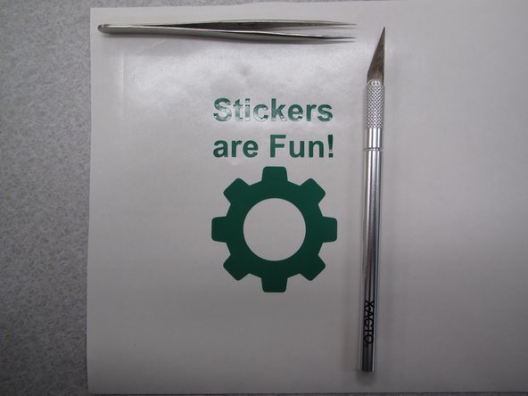 Hint: Using an X-Acto knife is helpful during this process, particularly when removing small pieces of vinyl from negative space.