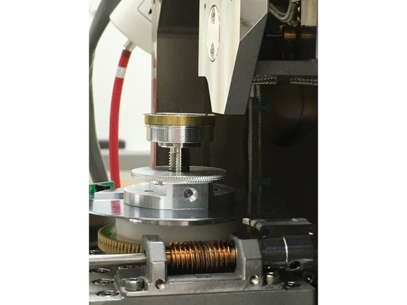 Slide your sample holder assembly onto the stage.