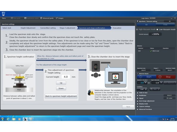 Partially close the specimen chamber. You want your specimen to clear the equipment guard by around a millimeter but two millimeters of clearance is better than none.