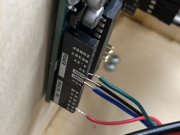 Put the red wire into the &quot;A5&quot; terminal on the Arduino, and but the green wire into the a ground &quot;GND&quot; on the Arduino.