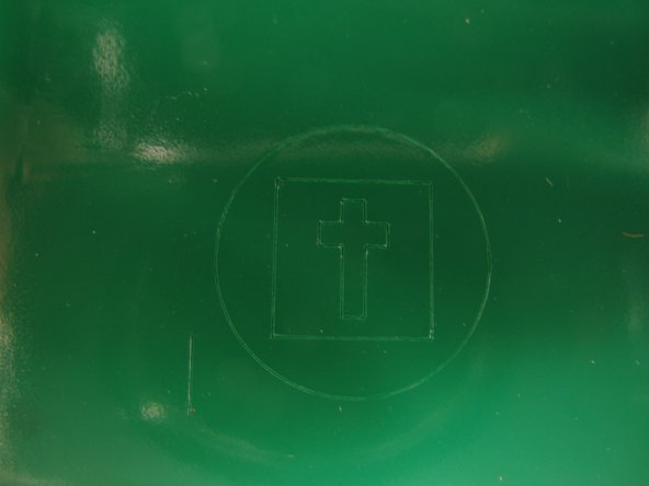 Hold down the TEST button until the vinyl cutter begins to move, then release the button.