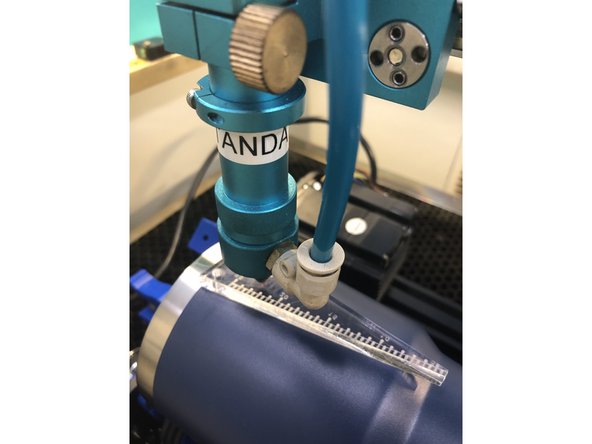 Adjust top focal point by moving head to the mug, make sure the the distance between head and mug is the thickness of the clear white acrylic ruler. (Pic 1)