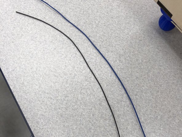 Take seven strands of wire ribbon.  Keep them attached to each other, but separate slightly at the ends.