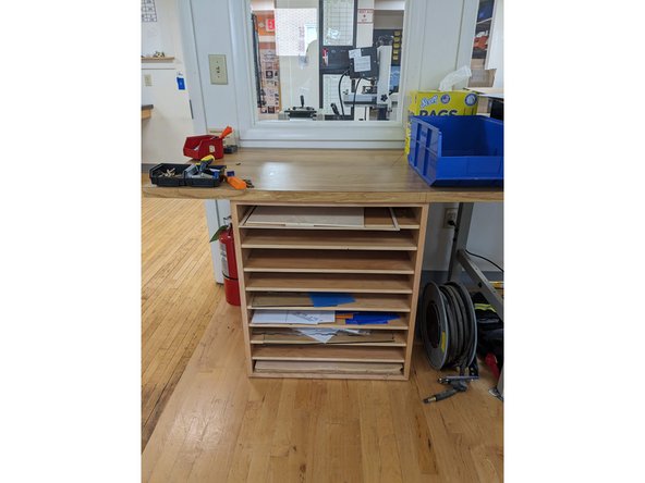 Before going to the laser cutter computer, you want to make sure you have your material. In the laser cutter room, we have a desk with shelving that has FREE scrap materials for you to use.