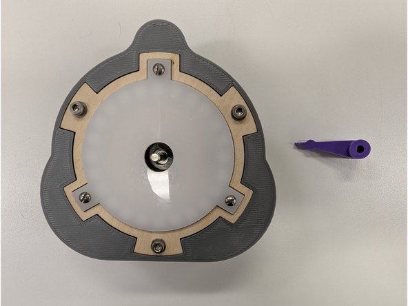 Locate the 3D printed motor arm you designed and printed previously.