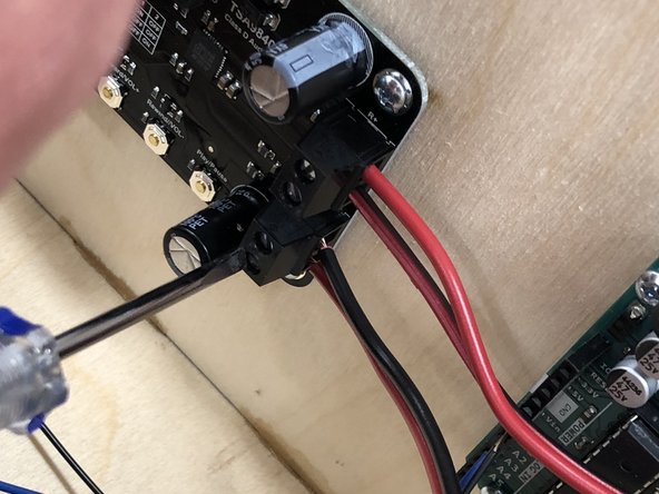 The connections for speakers are the screw terminals on the right-hand side (as you face the box) of the amplifier.  The &quot;left&quot; speaker is the top two slots, the &quot;right&quot; speaker is the two on the bottom.