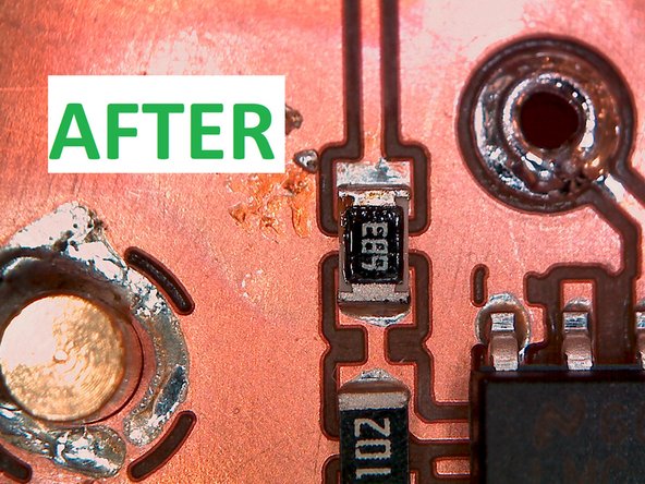 After lifting the iron and the copper braid the solder bridge should be removed.  If it is not completely removed you may need to apply more pressure to the braid, or leave the iron on for a longer period of time.