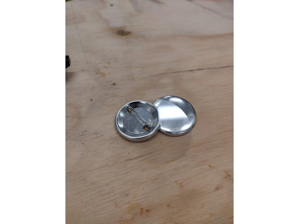 Locate mylar, pinback, and shell parts