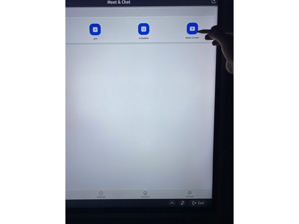 There are two main ways to share your screen to Zoom: the main menu ribbon, and the standard share screen button when you've already in a meeting.