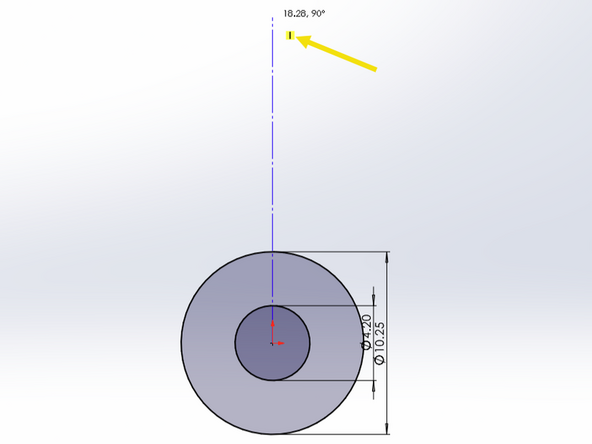 Click once to anchor the centerline in the center of your concentric circles.  Now move the mouse up to create a dotted line extended up from your circles.  Make sure the line is perpendicular by confirming there is a small yellow icon beside the line.  Click one more time to end the line.  The length of the line is not important.