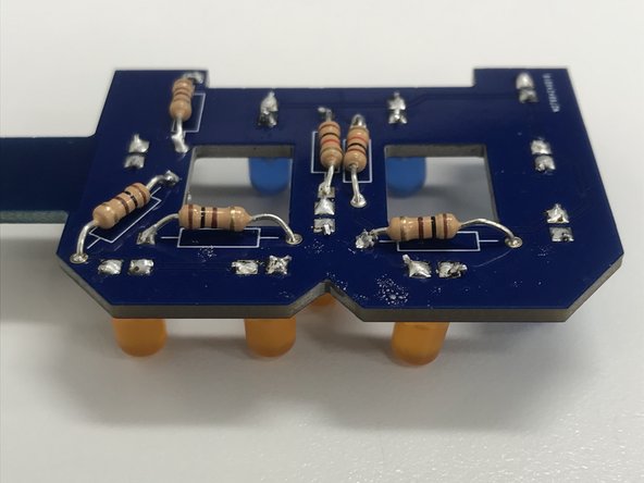 You may wish to wear safety glasses when clipping the leads, as the ends of the leads will often fly up when clipped.  Alternatively, you can hold the lead with one hand and clip with the other.