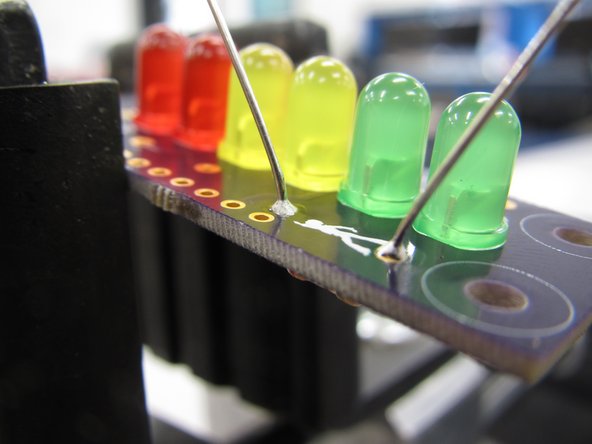 Be careful! While the LEDs were in a plastic case which could be held by hand during soldering, the ceramic resistor case WILL GET HOT during soldering. Do not touch the resistor while soldering!