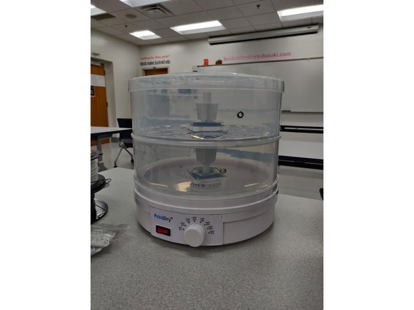 When the filament has finished drying, remove it from the device and turn it off.