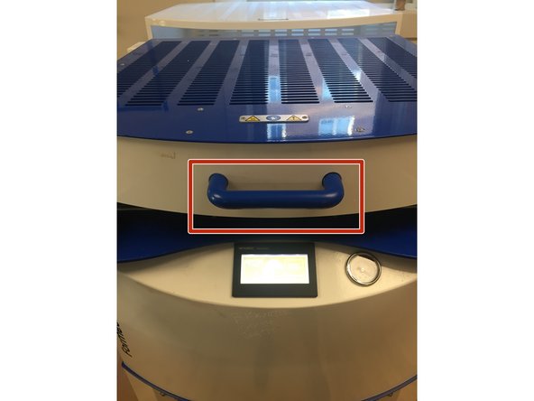 A red screen will then appear instructing you to pull the heat bed forward to begin heating your plastic.