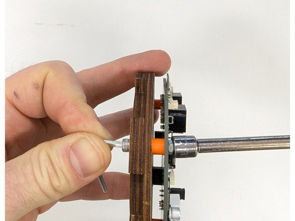 Be sure to tighten all three nuts+bolts securely when you're done.  Use the provided hex key to rotate the bolts and use a tool to hold the nuts such as a 6 mm hex driver, an adjustable wrench, or a pair of needlenose pliers.