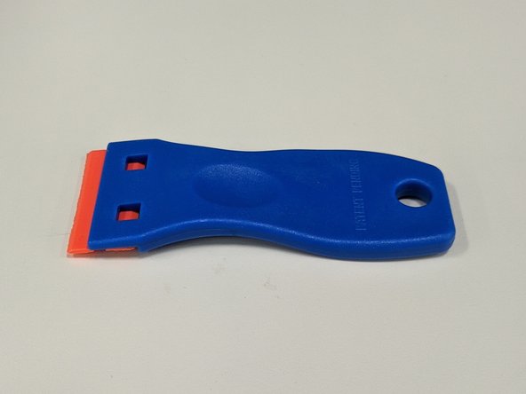 If you find that there is debris on the print surface you can lift it up by the front left corner and remove it from the printer.  Lay the surface on a table and use one of the water spray bottles to spray the surface and wipe clean with a microfiber cloth.