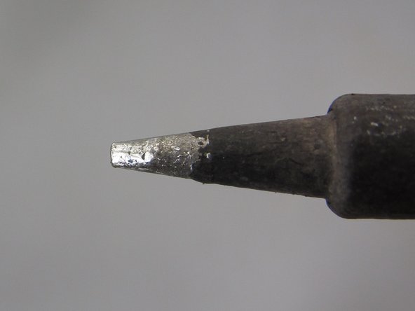 Use the tip tinner available in the Maker-E.  This tinner is composed of a mild acid plus some solder which should help remove any oxidation remaining on the tip.