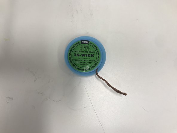 You can use a soldering iron to heat individual solder joints until they reflow.  Be sure to hold your SMT components in place with a metal object so that they do not lift off of your PCB along with the hot iron tip.  See the soldering tutorial for more information on soldering.