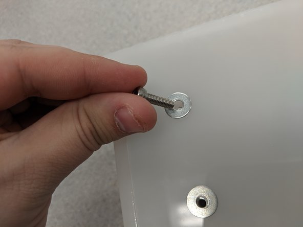 Screw the M4 screws into these holes.