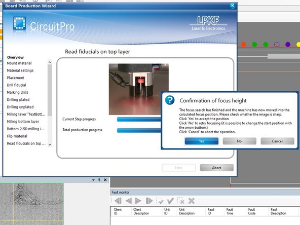 After completing the top milling phase the mill will pause to again find the fiducial holes.  While this step is not necessary from a production standpoint, it allows the user time to inspect the top layer prior to routing out the PCB.