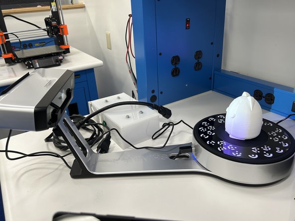 A texture scan will include the color(s) of the object while a non-texture scan will be gray. Texture scans take longer.