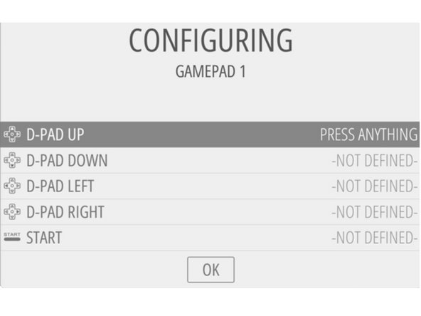Press a button or move the joystick to correspond to the requested input. You can arrow down the configure menu by holding in the start button.