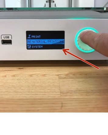 Scroll down to the Materials tab using the push/rotate button next to the display, then push on the push/rotate button to select.