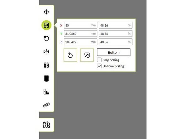 You can scale the object by clicking and dragging the red, blue or green icons coming out of the object depending on how you want to shrink or enlarge the file.