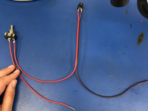 Solder the other end of the red wire to one lead of the power switch.