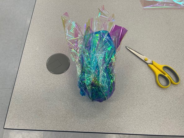 Use hot glue instead of glue dots