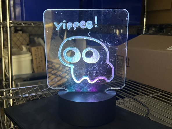 Slot the acrylic into the base