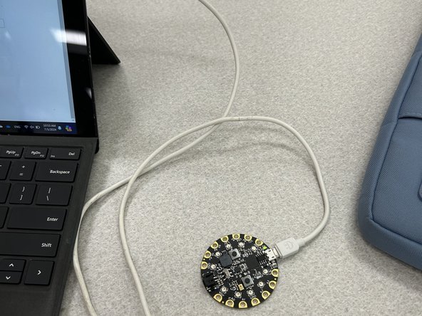 Download your code and follow the instructions given in MakeCode to upload the code to the CPX!