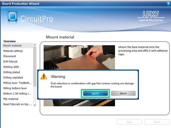 If prompted, choose to Ignore the warning about dust reduction.  This simply means that after routing (cutting) out your PCB, the mill will make a second pass along the routing channel in order to clean out debris generated by the routing bit.  The LPKF technicians have instructed us to follow this practice.