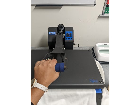 The timer will begin counting down and will beep when complete. You should press your design for 20 seconds.